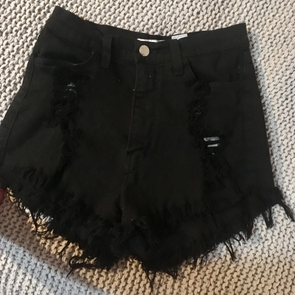 Distressed black high waisted shorts